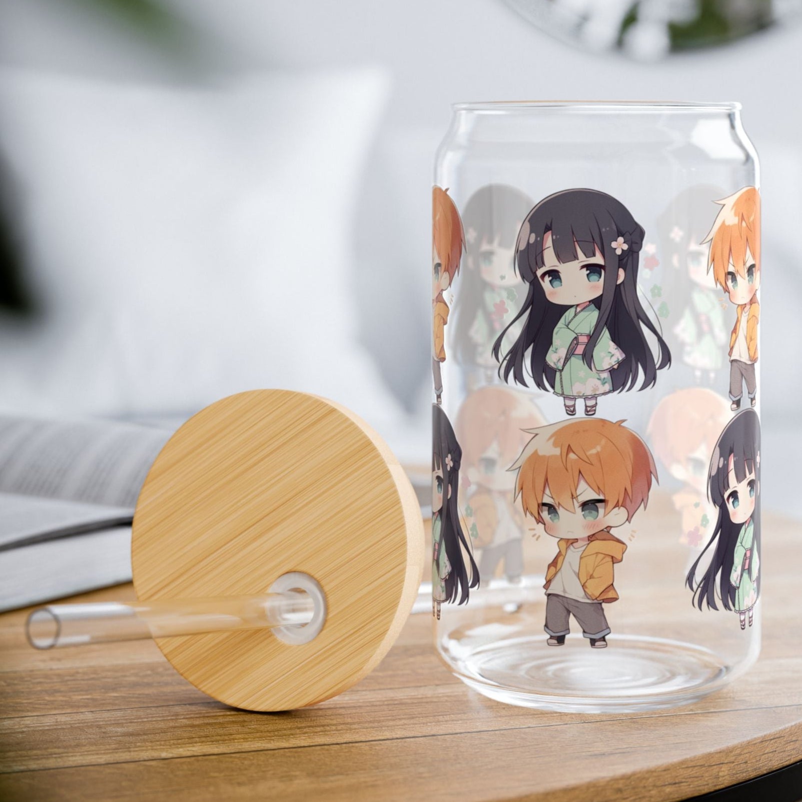 Clear glass tumbler with anime character design on a wooden table